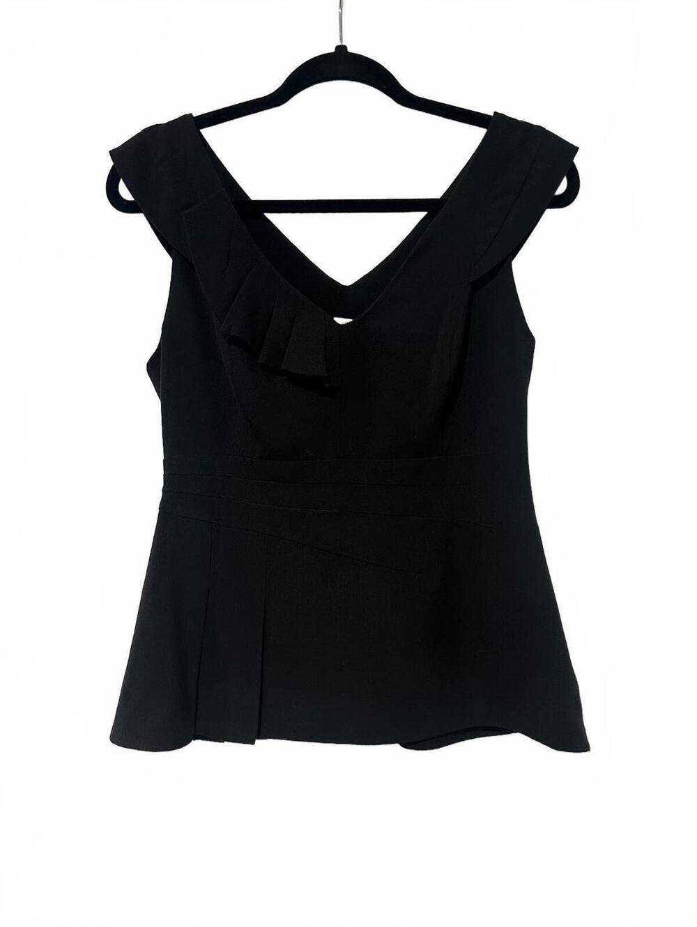 Florcat black peplum sleeveless top